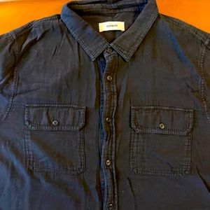 Black button down shirt by Buck Mason